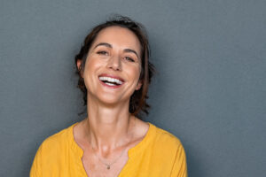 Maintaining Dental Implants: Daily Care, Foods To Avoid, And Long-Term Tips